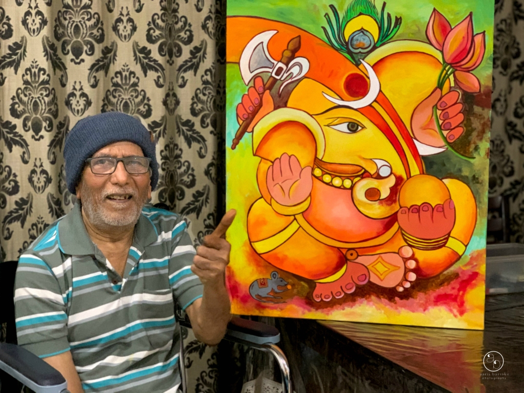 Mr Dahale with the completed Ganesha painting.
